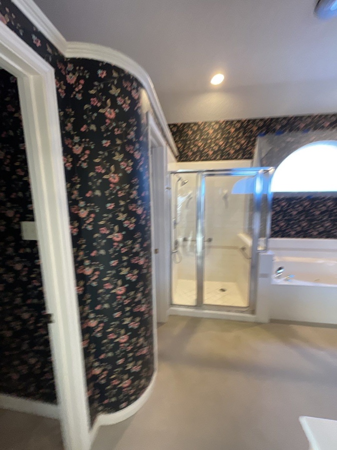 San Antonio bathroom remodel by Wade Caldwell Construction with curved wall