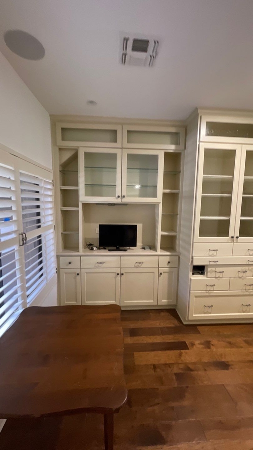 Built-in cream cabinetry and desk nook in remodeled San 