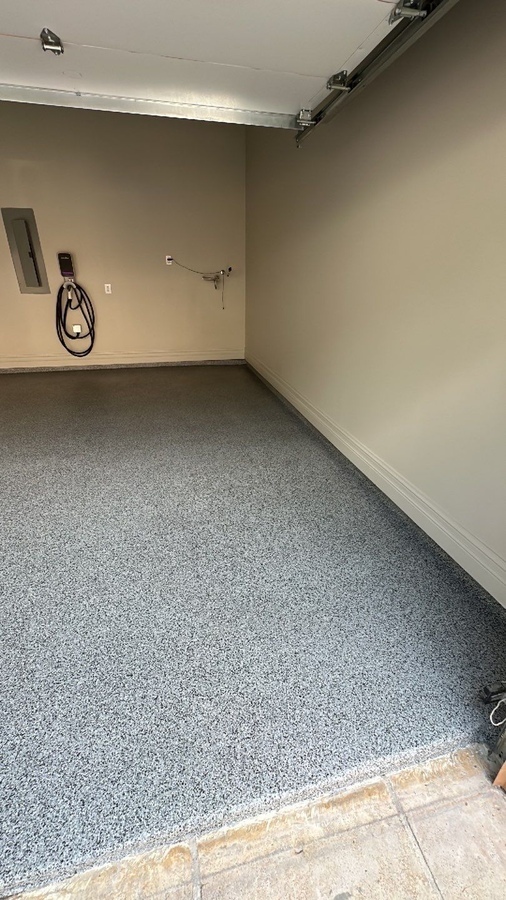 Epoxy-finished garage floor and modern upgrades by Wade Caldwell Construction in San A