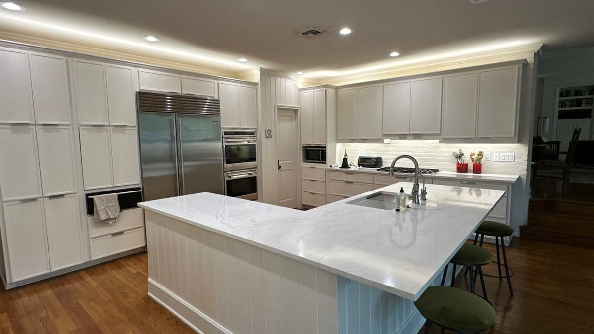 Large U-shaped kitchen with pendant lighting in San Antonio by Wade Caldwell Construction