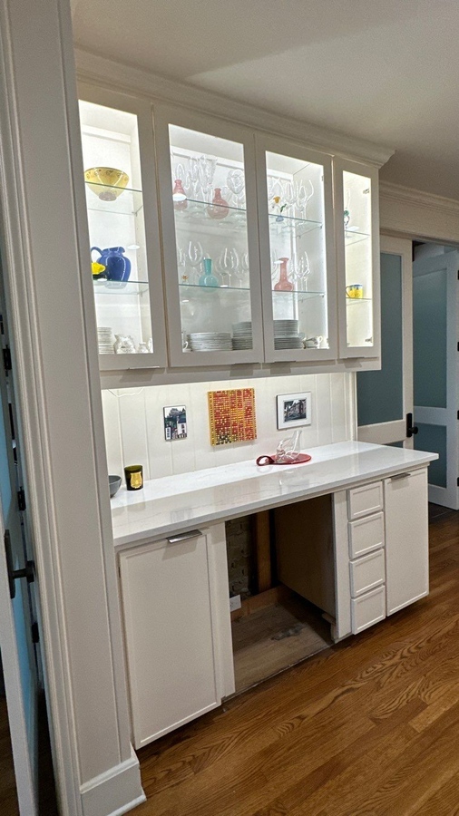 Wade Caldwell Construction kitchen upgrade in San Antonio with glass shelving and accent li