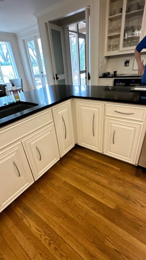 Updated kitchen with peninsula seating and transitional cabinetry in San Antonio by Wade C