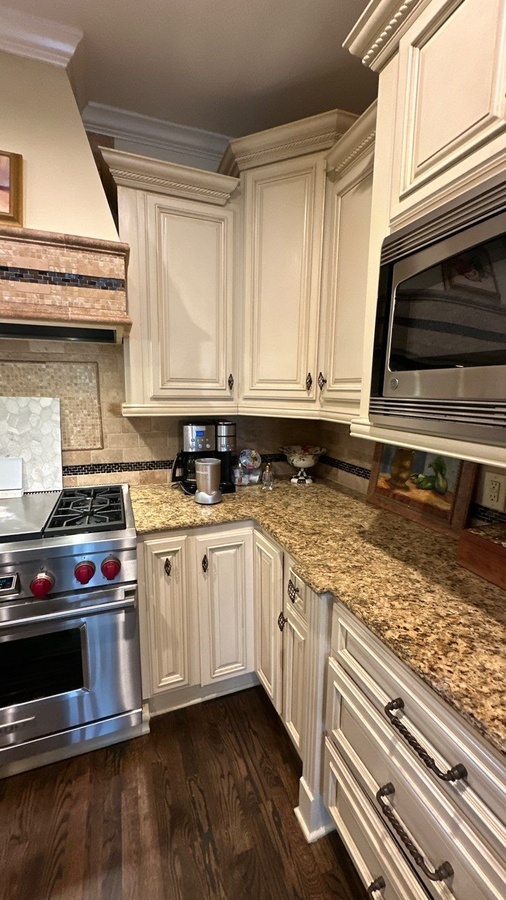 Traditional kitchen upgrade in San Antonio featuring warm cabinetry and small appliance area b