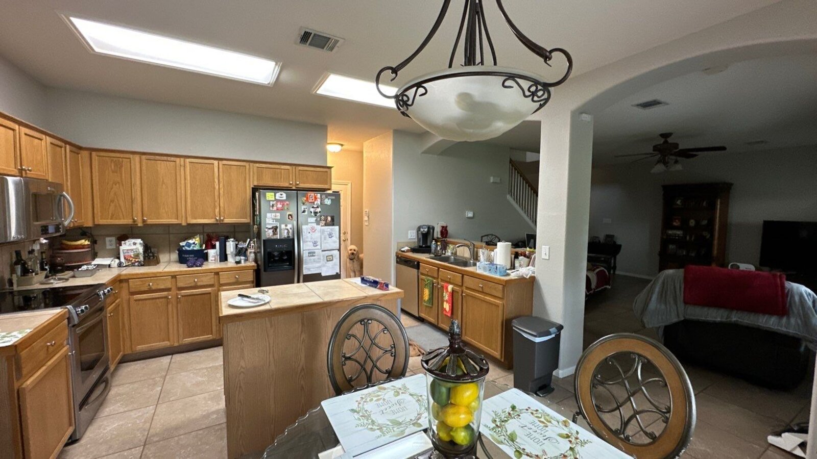 Wide view of kitchen and dining area prior to remodeling by Wade Caldwell Construction in San Antoni